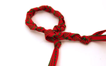 Braided ribbon wreath ornament step 6 insert end knot through braid