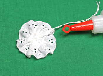 Button and Lace Ornament step 12 glue yarn to seam