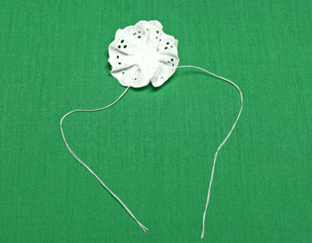 Button and Lace Ornament step 6 tie thread ends