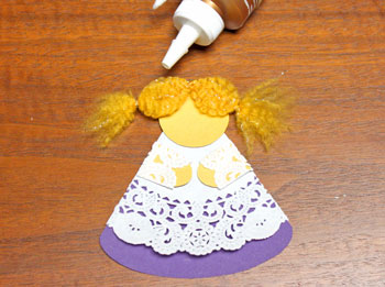 Cardstock and Doily Angel step 16 glue hair