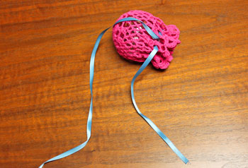 Crocheted Doily Wrapped Ornament step 4 insert ball