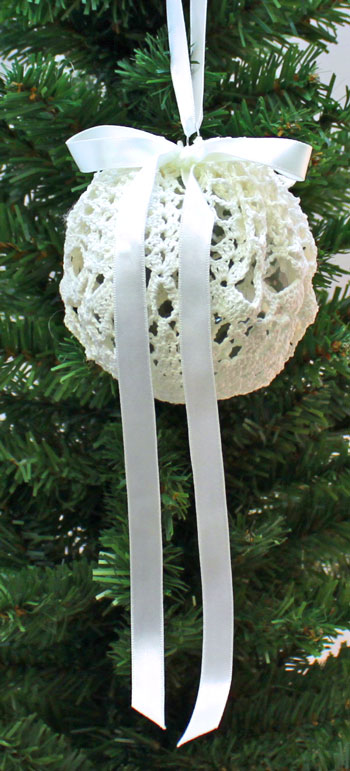Crocheted Doily Wrapped Ornament white finished on tree