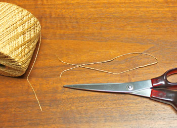 Curled Paper Angel step 12 cut yarn