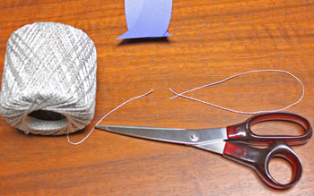 Curved Paper Angel step 8 cut yarn