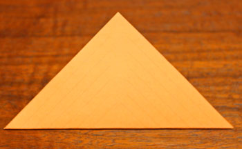 Cut Paper Square Ornament step 2 fold on diagonal
