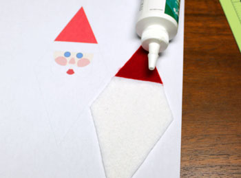 Diamond Santa Claus step 8 glue white felt to poster board