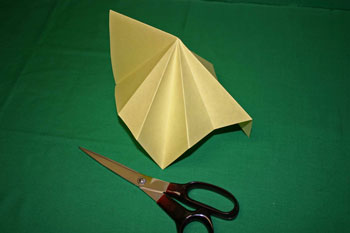 Easy Christmas crafts - folded paper Christmas tree fold halfway between earlier folds