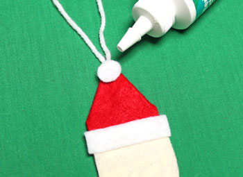 Easy Felt Santa Claus Ornament step 8 glue top of hat