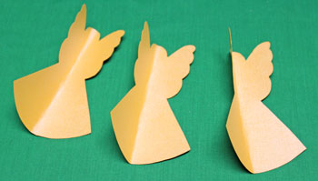 Folded Paper Angel step 3 bend shapes in half