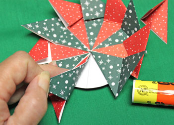 Fold Paper Spiral Bow step 9 glue last angle