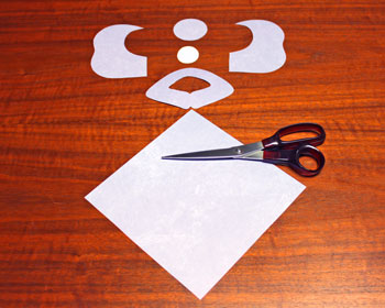 Folded Square Paper Angel step 2 cut shapes