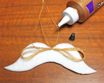 Mustache Angel step 9 glue yarn bundle