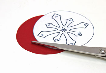 Paper Doily Snowflake Ornament step 1 cut circle