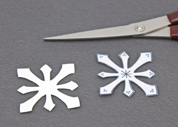 Paper Doily Snowflake Ornament step 4 cut snowflake