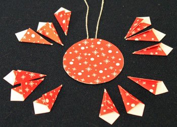 Easy Christmas Crafts Paper Pinwheel Wreath Ornament step 10 three in each quadrant