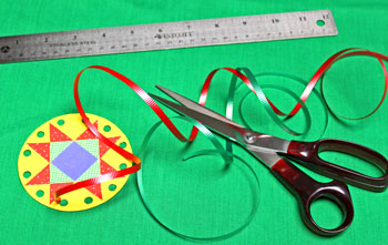 Paper Quilt Patch Ornament step 10 measure and cut ribbons