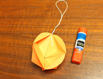 Pyramid Ball Ornament step 11 glue yarn
