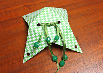 Pyramid Box Ornament step 10 tie ribbons together