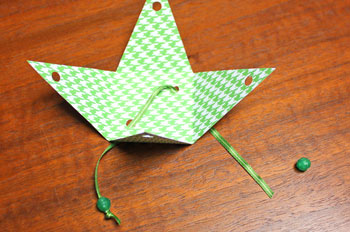 Pyramid Box Ornament step 7 thread ribbon through base
