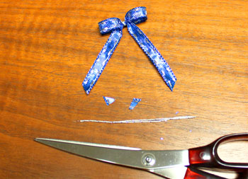 Star Box Ornament step 12 trim ribbon and yarn ends