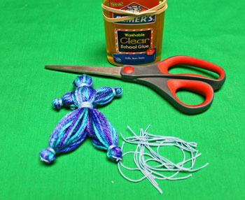 Yarn Elf Ornament step 17 trim yarn ends